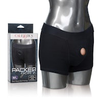 a black mannequin wearing a packer underwear