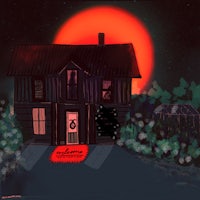 a house with a red sun behind it