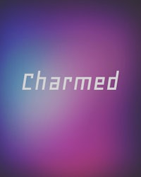 a blurry background with the word charmed