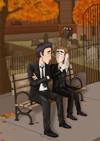 two men sitting on a bench in a cemetery