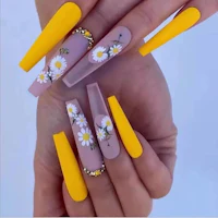 yellow and white nails with daisies on them