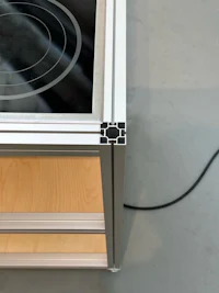 an electric stove is sitting on top of a table