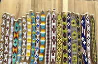 beaded bracelets on a wooden table
