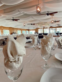 a white tablecloth with white napkins on it