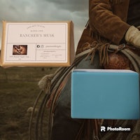 a man is sitting on a horse next to a box of rancher's sock