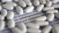 a group of pills with the word antidepressants written on them