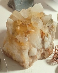 a group of crystals and wires on a table