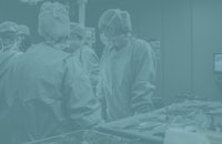 a group of surgeons in an operating room