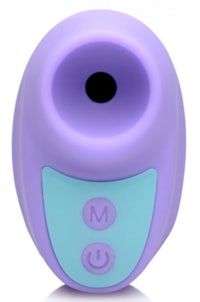 a purple and blue toy with a button on it
