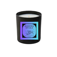 a candle with a blue and purple design on it