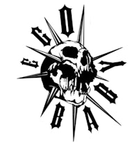 a black and white skull with spikes on it