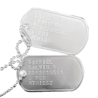 two dog tags on a black background
