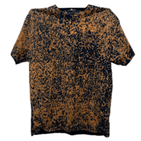 a black and orange splatter t - shirt
