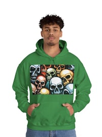 a man wearing a green hoodie with skulls on it