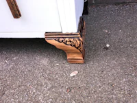 a piece of furniture with an ornate design on it
