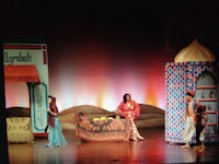 a stage with a group of people on stage
