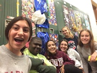 a group of girls posing for a picture