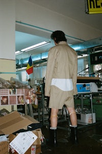 a man standing in a warehouse