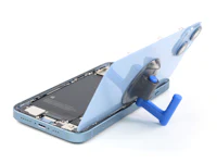 a blue phone with a blue holder attached to it