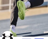 a person running up a set of stairs with a pair of under armour shoes