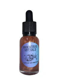 a bottle of liquid with the words adventure rites on it