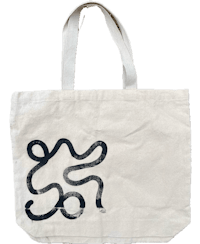a white tote bag with an image of a snake on it