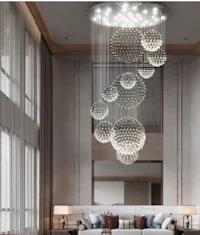 a modern living room with a large chandelier
