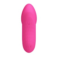 a pink vibrating toy on a white background