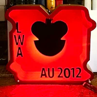 a red sign with the word lwa au 2012 on it