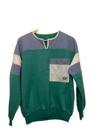 a green and white sweatshirt with a pocket on it
