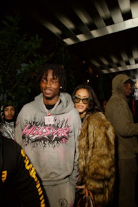 a man wearing a fur coat