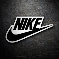 a black and white nike logo on a metal surface