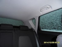 the back seat of a car is covered in snow
