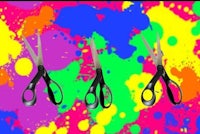 a pair of scissors on a colorful background