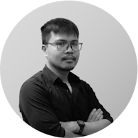 a black and white photo of a man with glasses