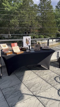a table with a black cloth on it