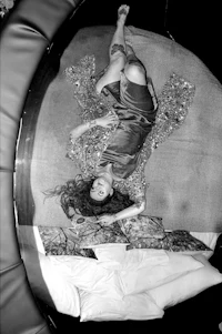 a woman laying on a bed