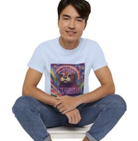 a man sitting on a chair wearing a t - shirt
