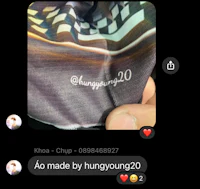 a person is holding a scarf with a logo on it