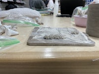 clay pots on a table in a workshop
