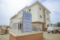 a building with a sign in front of it