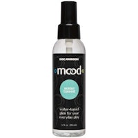 a bottle of mood spray on a white background