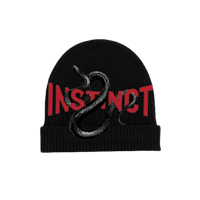 a black beanie with the word instinct on it