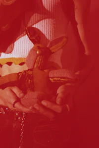a woman holding a stuffed animal