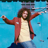 a man with curly hair