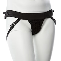 a mannequin wearing a black harness