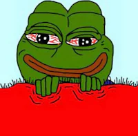 a frog with red eyes is sitting on a blanket