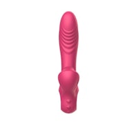 a pink sex toy on a white background