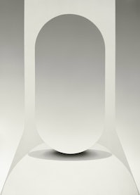 a white piece of paper with a hole in it