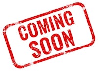 a red rubber stamp with the word coming soon